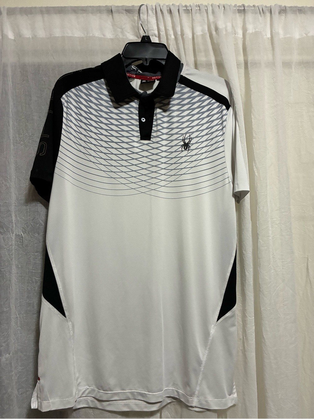 Spyder Men’s White and Black Performance Polo with Geometric Chest